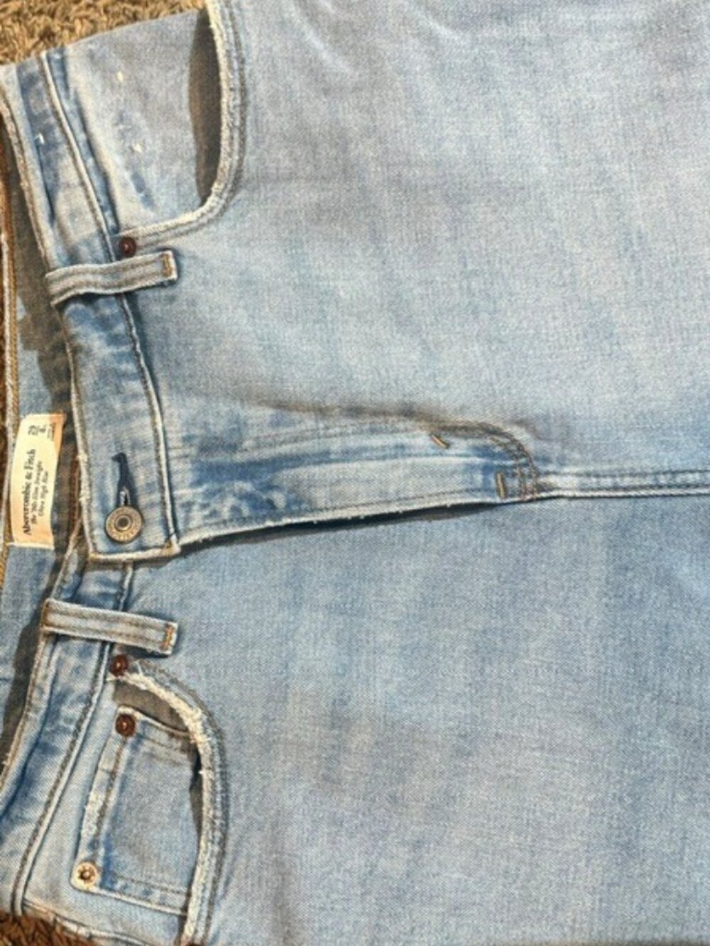 abercrombie & fitch asymetrical button jeans
